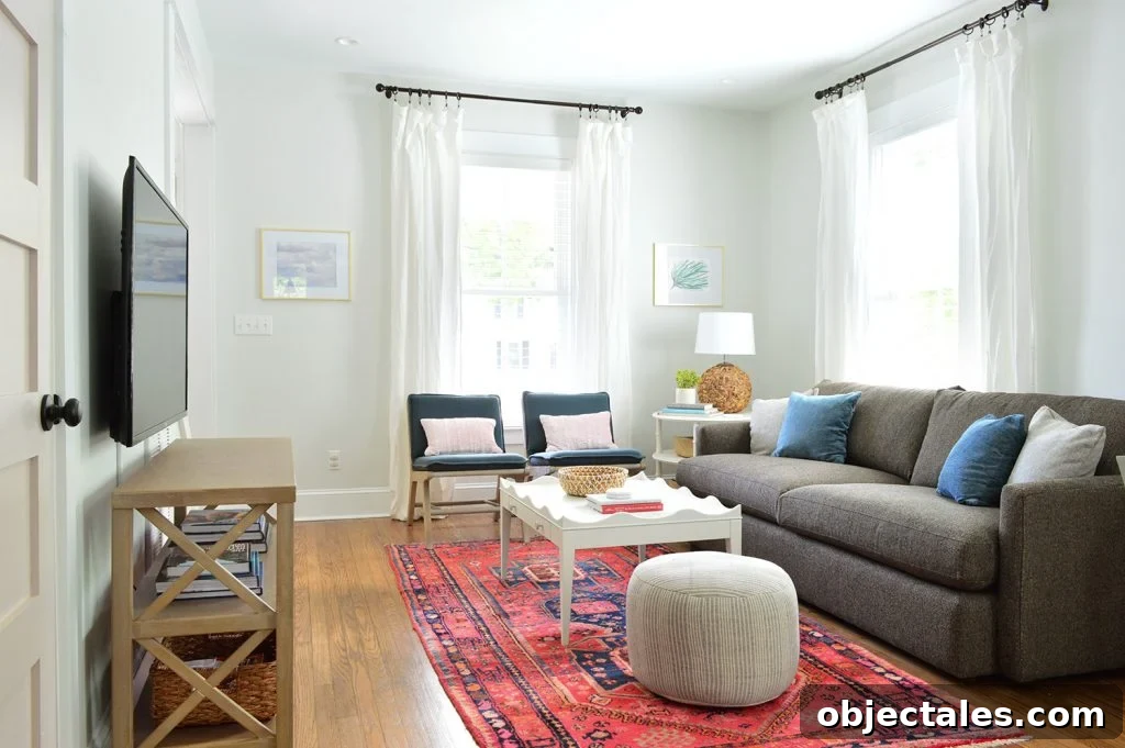 Duplex Living and Dining Room Makeovers Revealed 6 Bright Living Room Red Rug With Blue Target Chairs Crate And Barrel Sofa