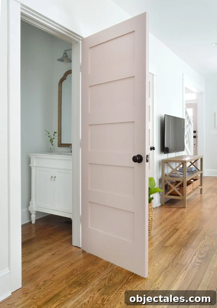 Duplex Living Room and Dining Room Transformations 14 First Floor Powder Room With Pink Door