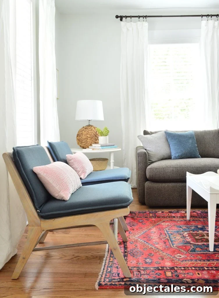 Duplex Living Room and Dining Room Transformations 3 Blue And Wood Target Accent Chairs In Bright Living Room