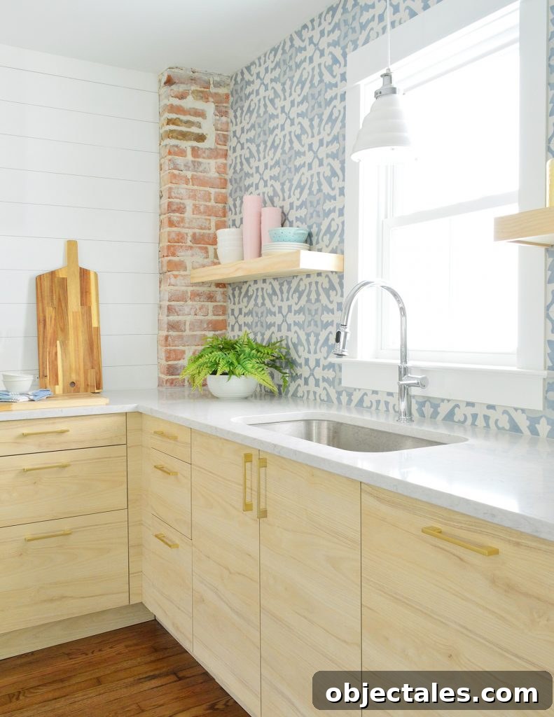 Duplex Kitchen With Blue Tile And Wood Open Shelves And Chimney
