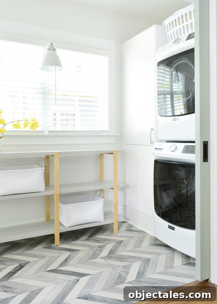 Duplex Laundry Room With Open Shelf And Stacked Laundry