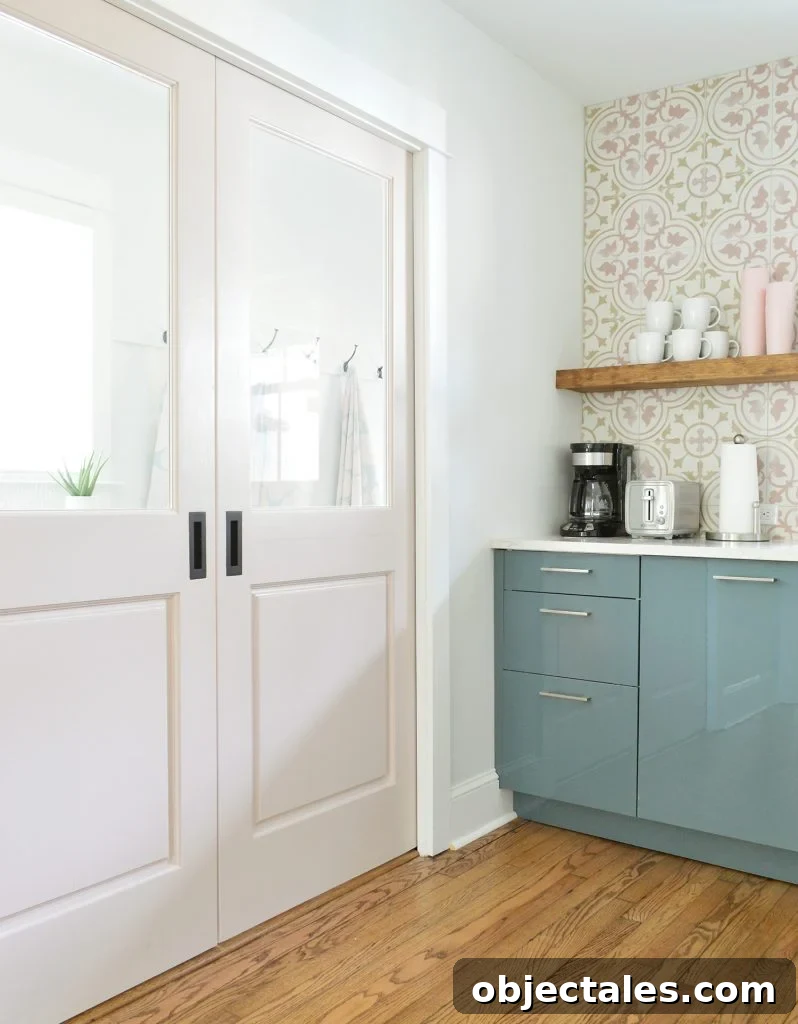 Pink Pocket Doors Between Duplex Kitchen And Mudroom