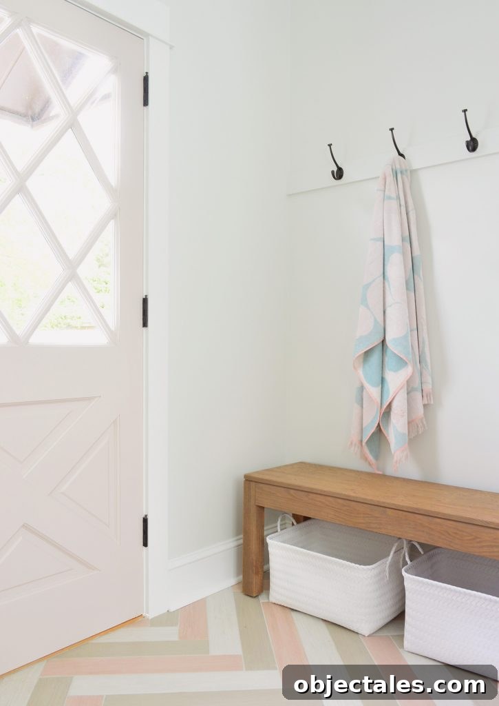 Towel Hook Rail With Pink Diamond Door In Duplex Mudroom With Bench