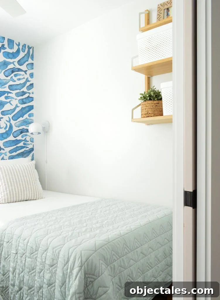 This image has an empty alt attribute; its file name is Duplex-Bedroom-Blue-Whales-Door-Shelf-751x1024.jpg