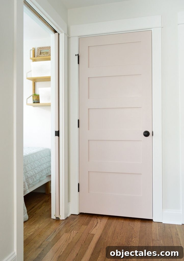 Duplex Hallway Linen Closet With SW White Truffle Door Closed