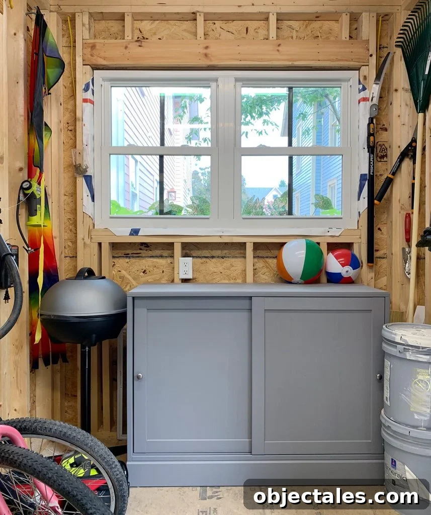 Gray storage cabinet inside shed