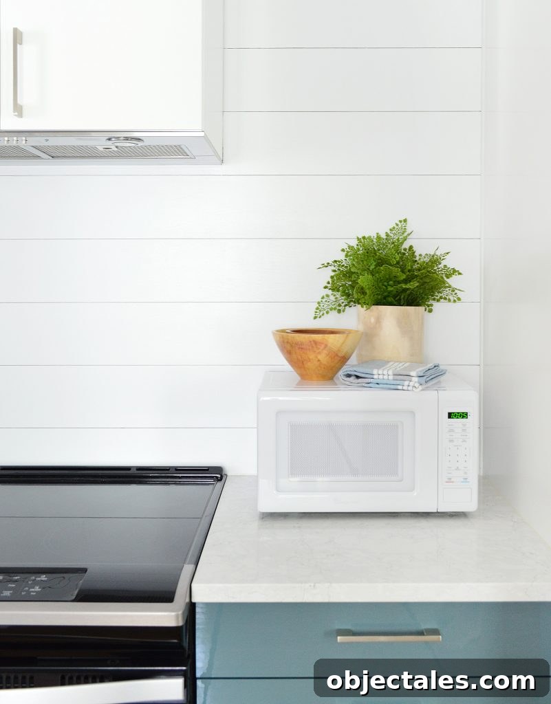 Shiplap Wall Plank Makeover for Just 31 Dollars 2 Shiplap Planking Detail In Duplex Kitchen With Blue Cabinets