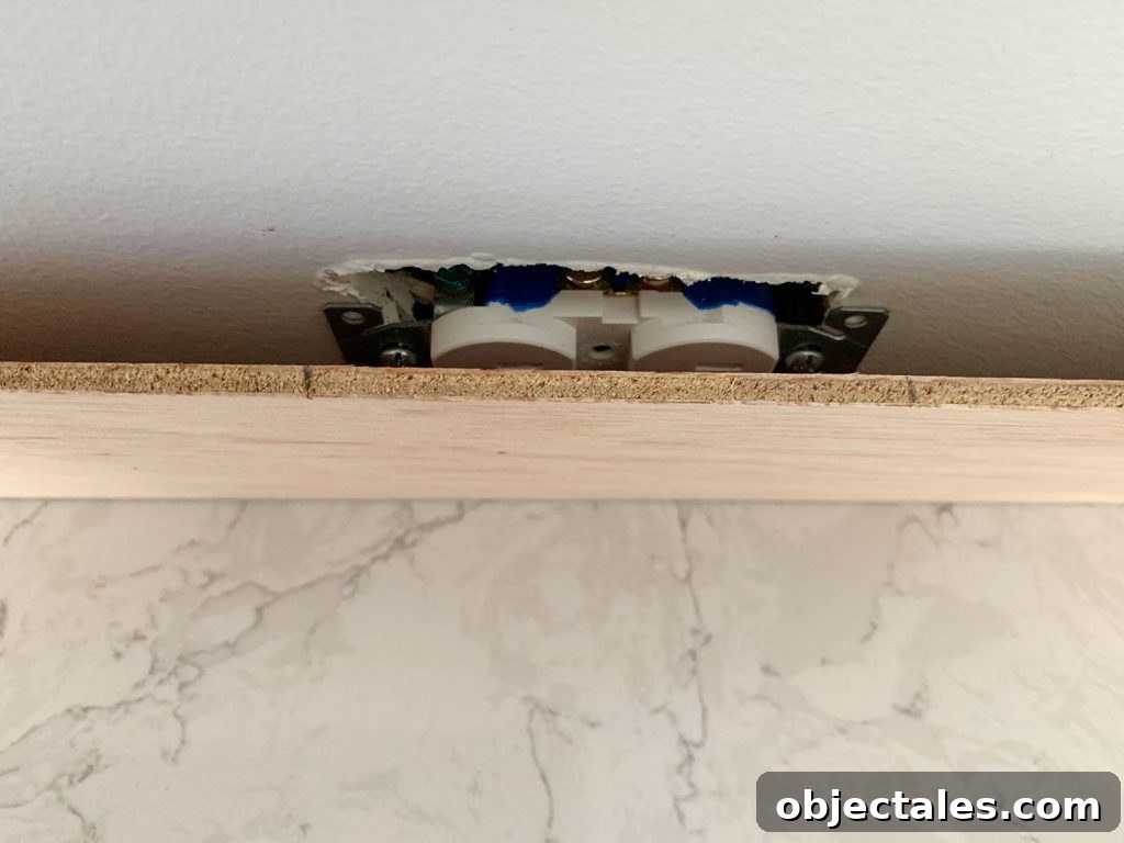 Shiplap Wall Plank Makeover for Just 31 Dollars 14 Panel Marked In Front Of Electrical Outlet