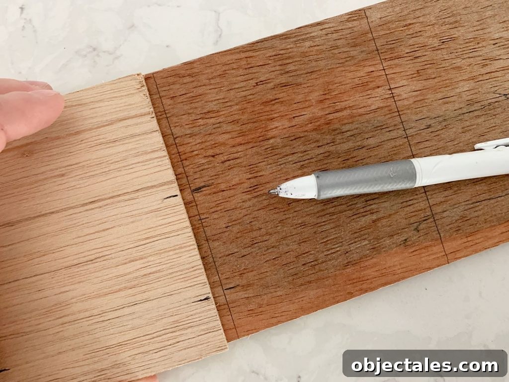 Shiplap Wall Plank Makeover for Just 31 Dollars 16 Lines Marked For Cutting Hole For Electrical Outlet