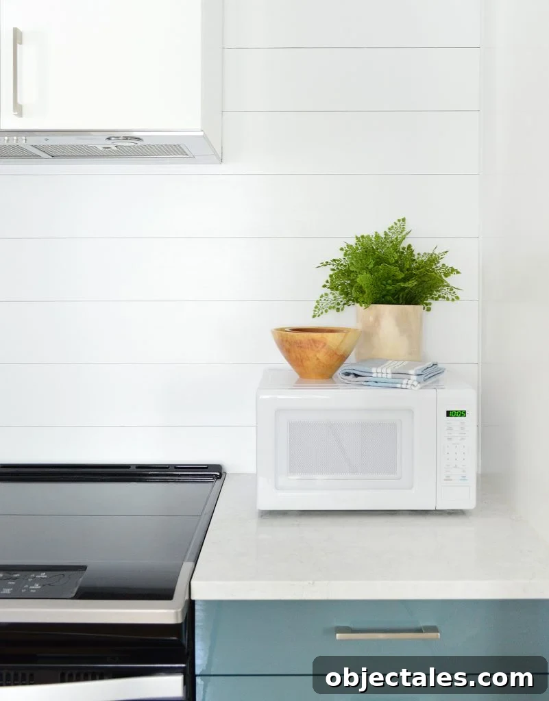 Shiplap Wall Plank Makeover for Just 31 Dollars 23 Shiplap Planking Detail In Duplex Kitchen With Blue Cabinets