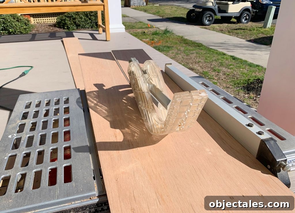 Shiplap Wall Plank Makeover for Just 31 Dollars 7 Cutting Wood Strips In Half Along Table Saw For Shiplap Look