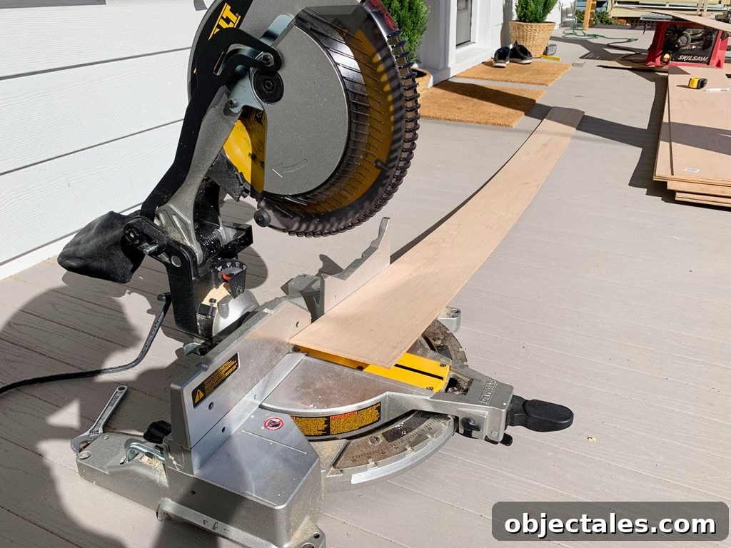 Shiplap Wall Plank Makeover for Just 31 Dollars 8 Miter Saw Set Up To Cut Panel Strip To Length