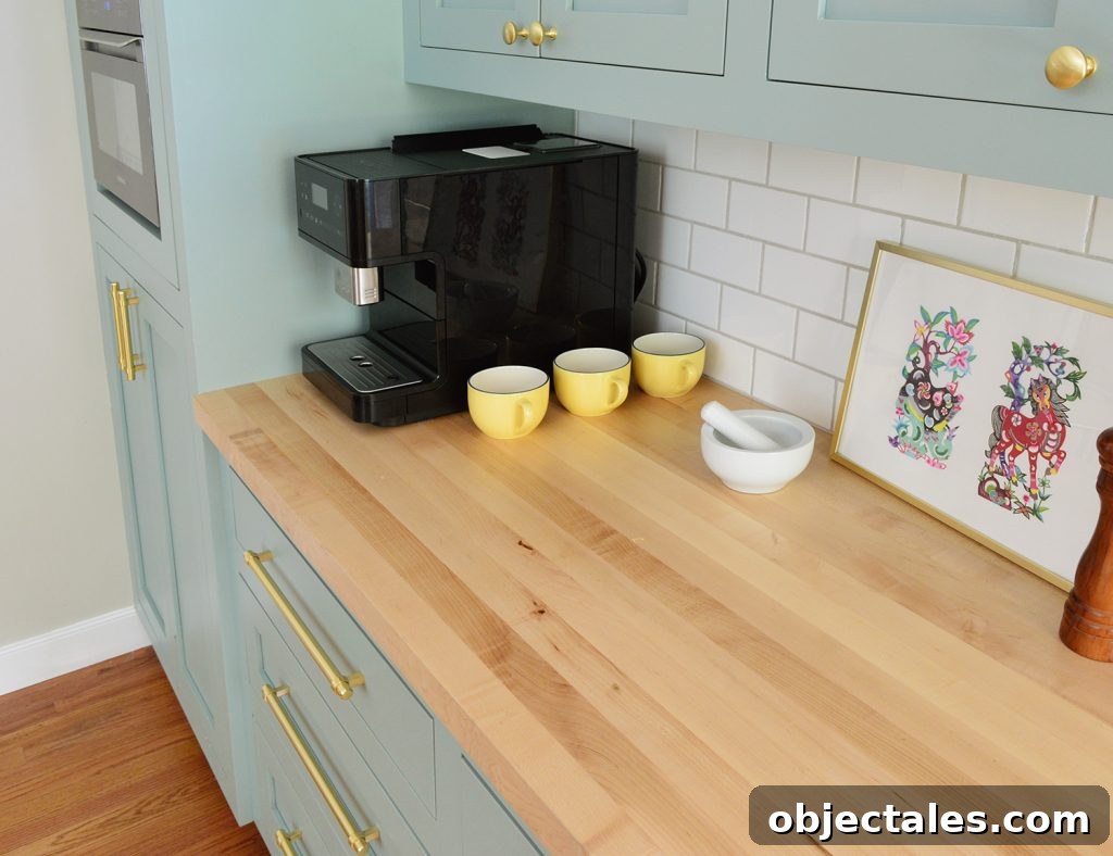 Butcher Block Countertop With Subway Tile Backsplash in Halcyon Green Blue Kitchen