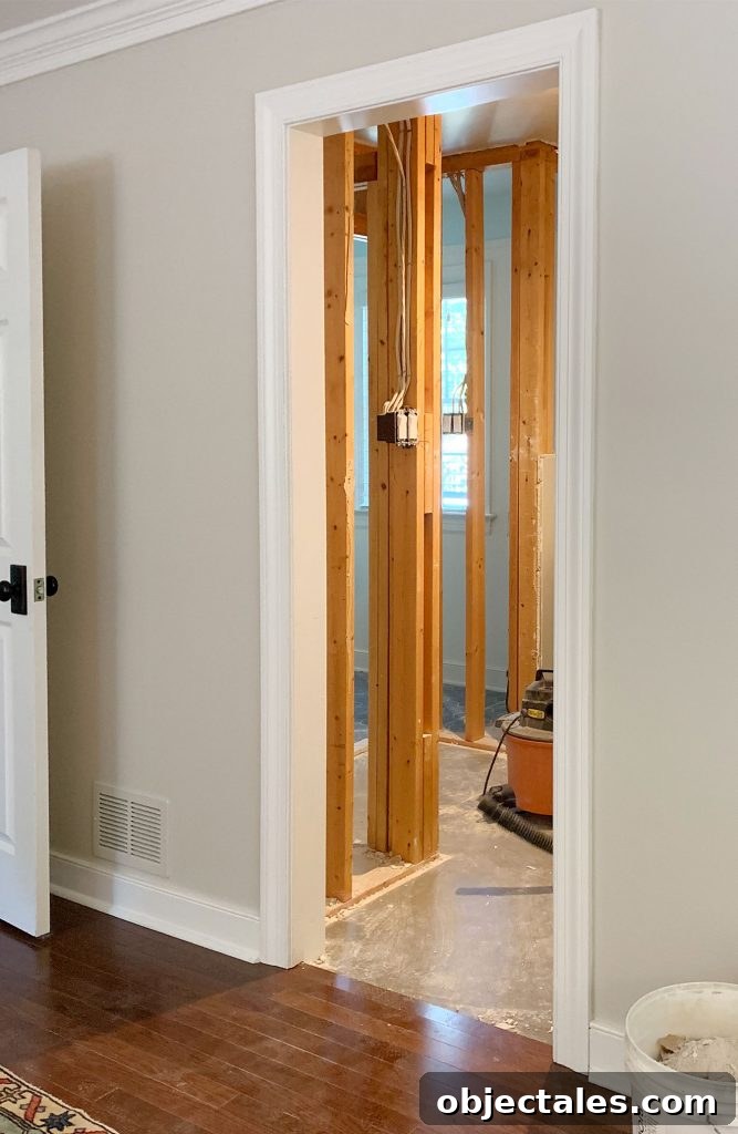 How to Start a Bathroom Renovation: Planning and Budget Tips 9 Bright opened up bathroom visible from bedroom
