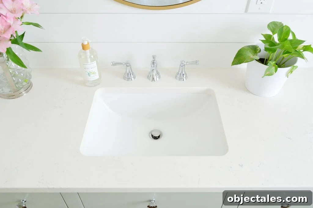 Bathroom vanity sink with silver faucet