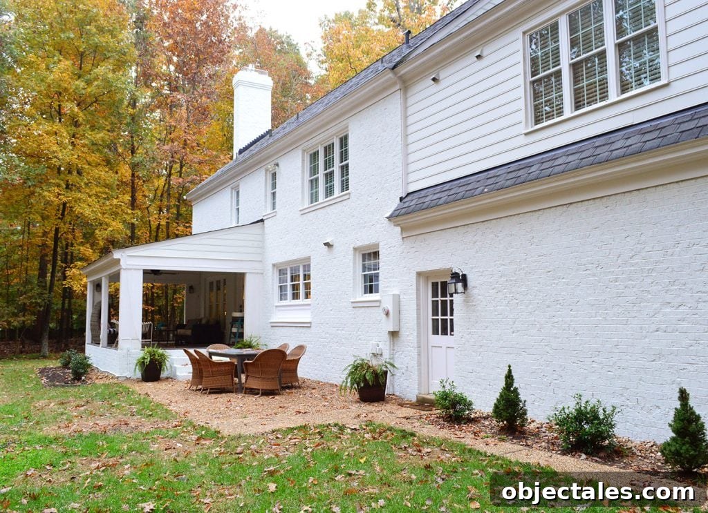 Build a DIY Garden Trellis: Step-by-Step Guide 3 White brick house with empty wall near garage