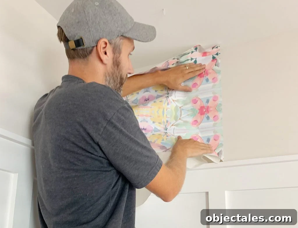 Placing First Panel Of Peel And Stick Wallpaper