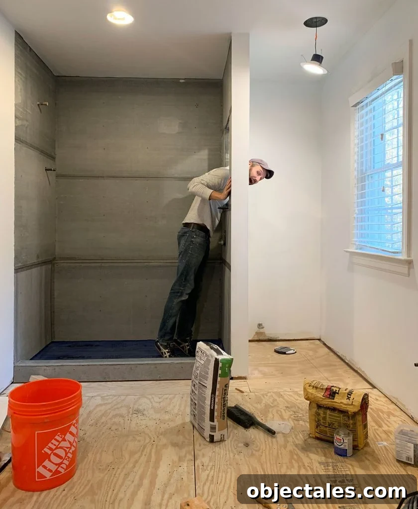 John Standing In Shower Mid Bathroom Renovation