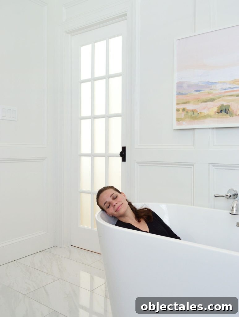 Sherry Relaxing In Freestanding Stub In Renovated Bathroom