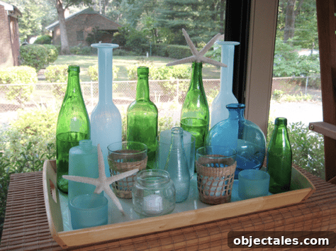 bottles and vases on tray in sun