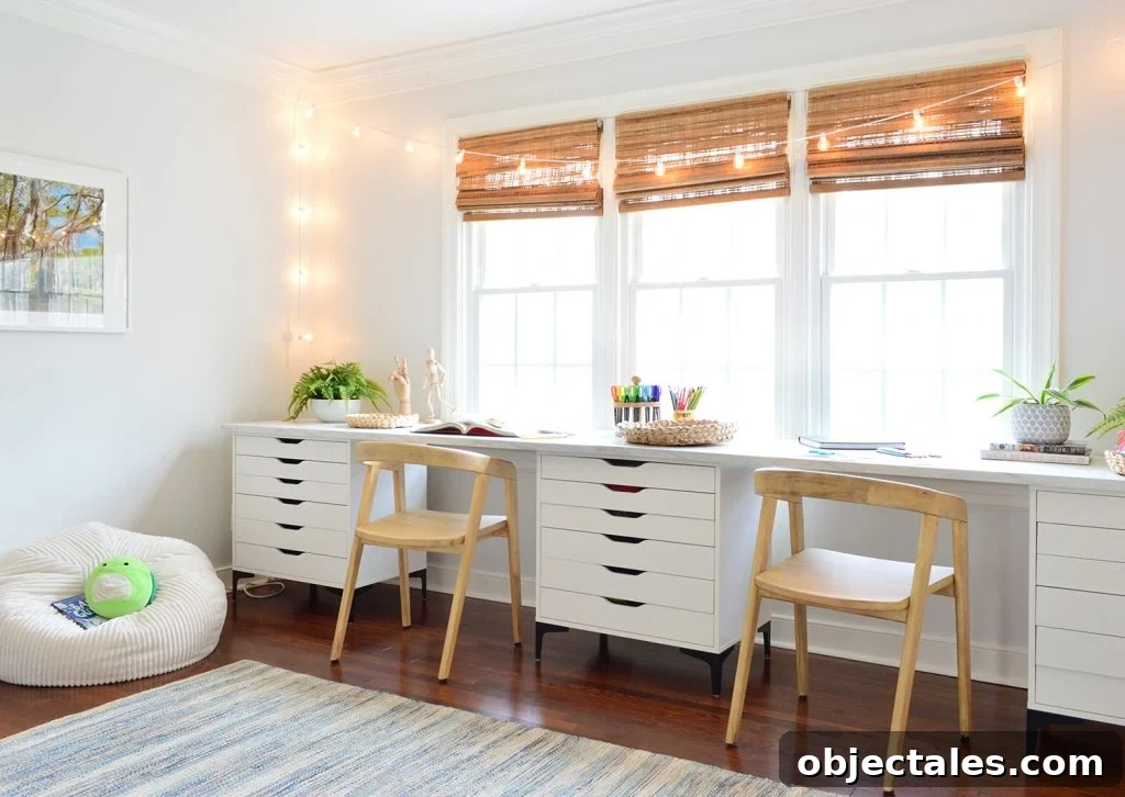 Kids Art Room With Two Wood Chairs Along Long Art Desk Workspace With String Lights