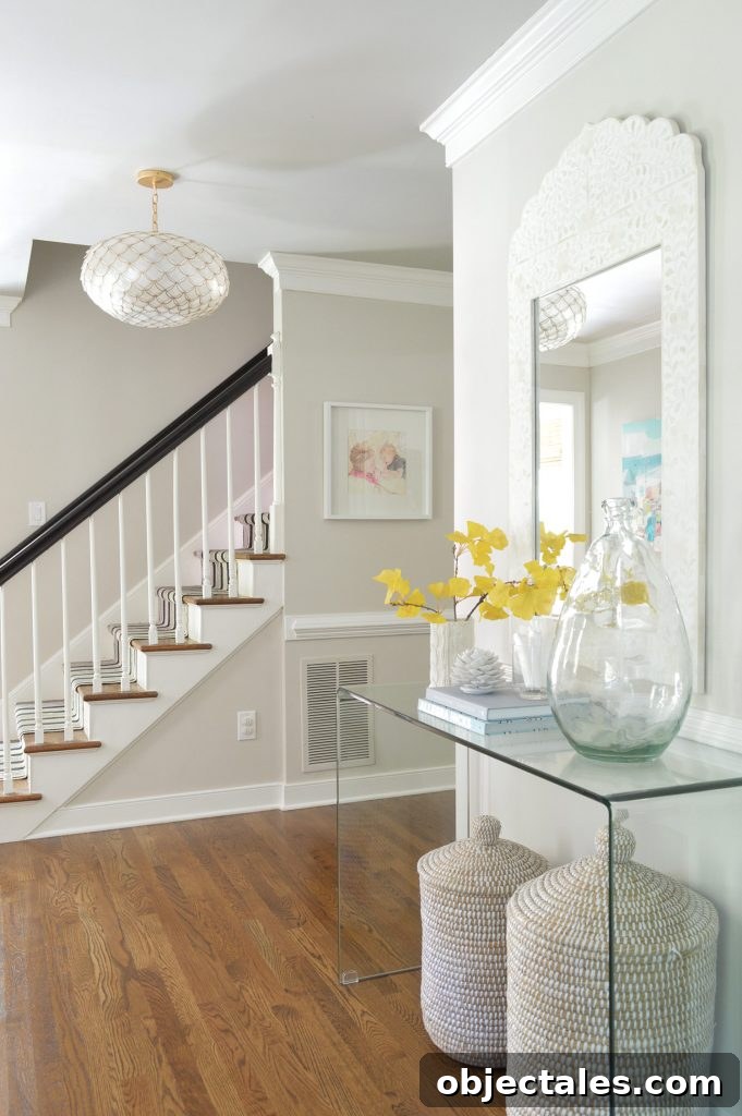 How to Downsize Your Stuff: Step-by-Step Guide 6 neutral foyer beachy capiz light gingko leaf