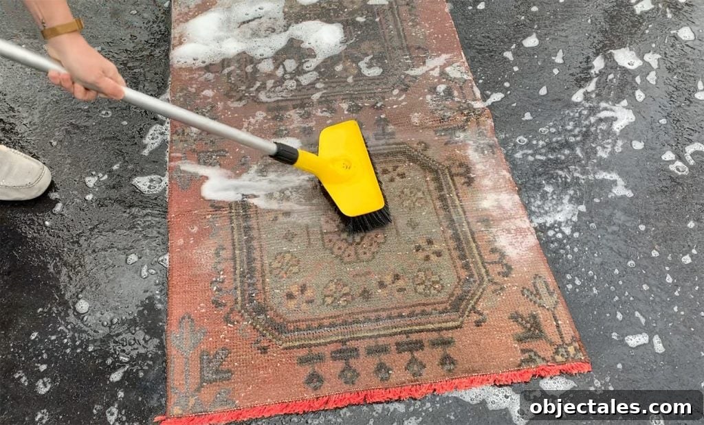 Scrubbing rug with stiff brush
