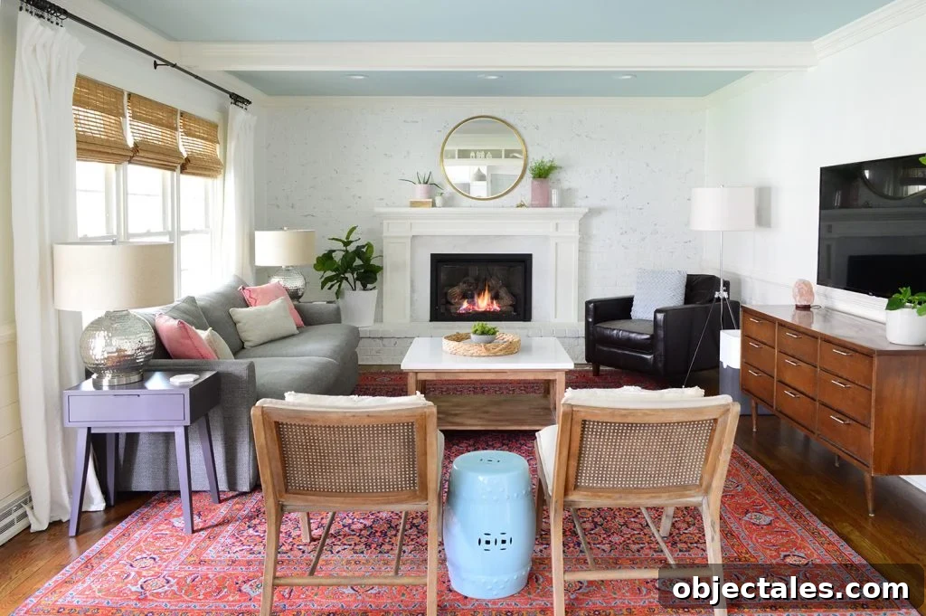 Two Final House Tours: Before and After Packing 4 Large living room with white walls beams and traditional red rug