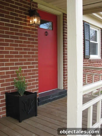 brick-house-red-door-black-shutters
