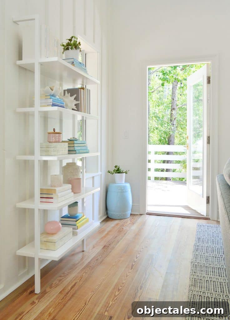 Upstairs Family Room: One-Month Update 9 Floating White Bookcase With Door Open To Deck