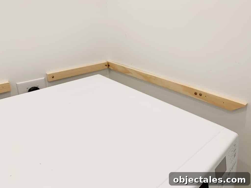 Side view of wall support for DIY laundry shelves