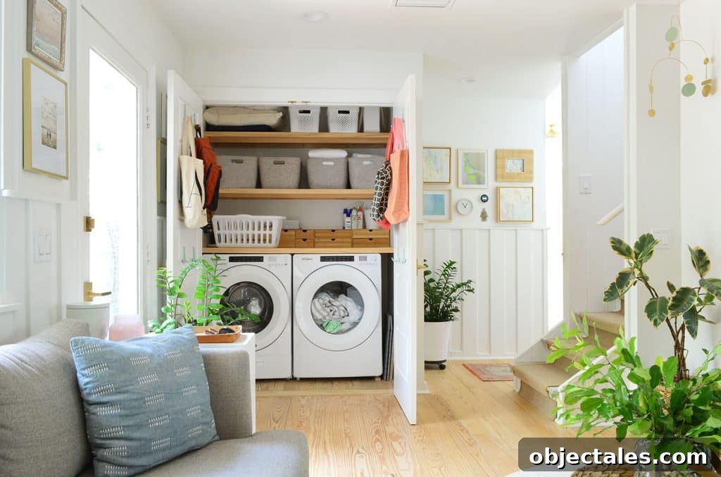 View Of Open Laundry Closet Behind Seating Area In Kitchen
