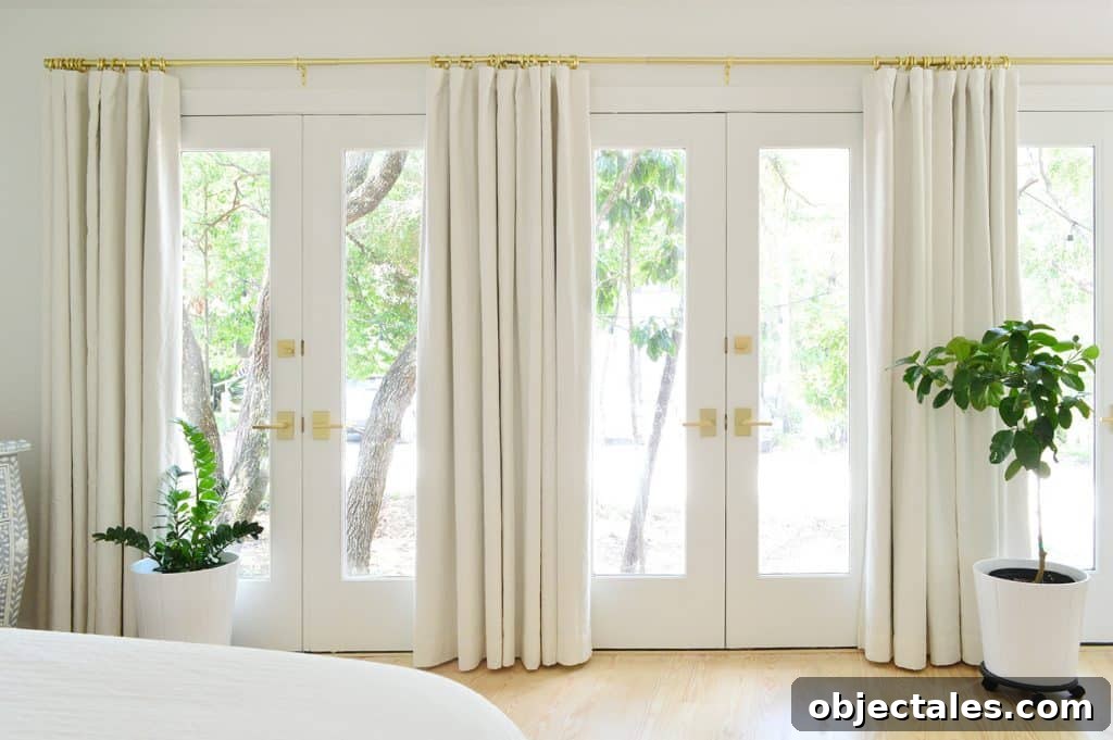 Bedroom Makeover Update: What We Changed and What's Next 9 Curtain rod close-up and rings