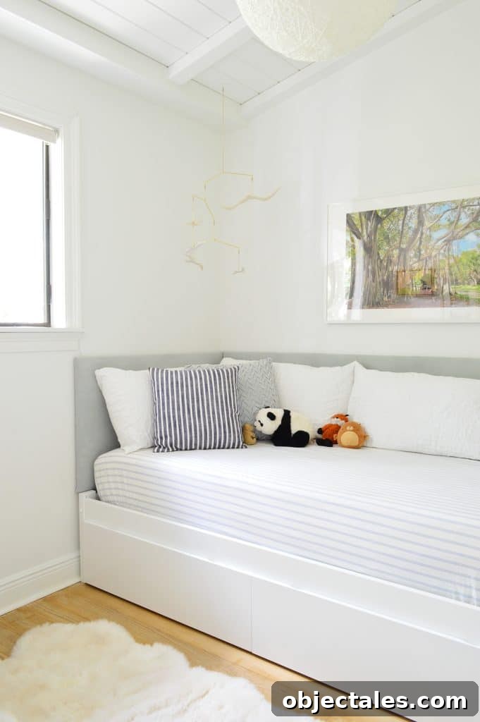 Boys daybed with upholstered DIY headboard on two sides