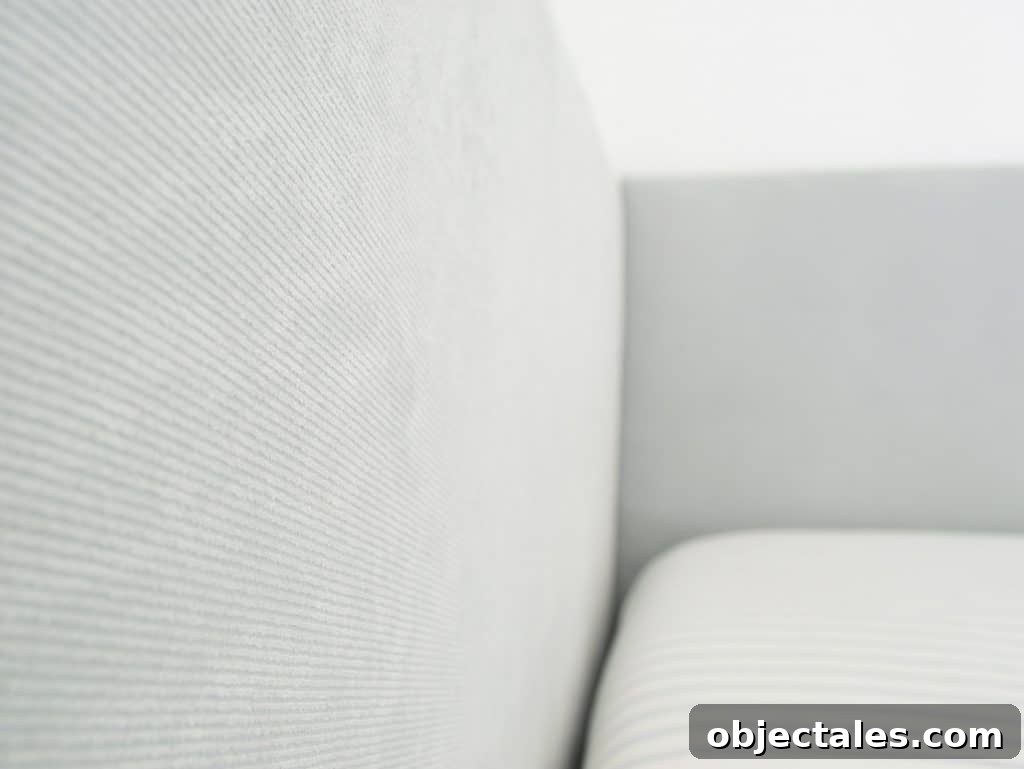Build a Stylish DIY Headboard in One Weekend 13 Fabric detail on DIY upholstered headboard with subtle blue ribbing