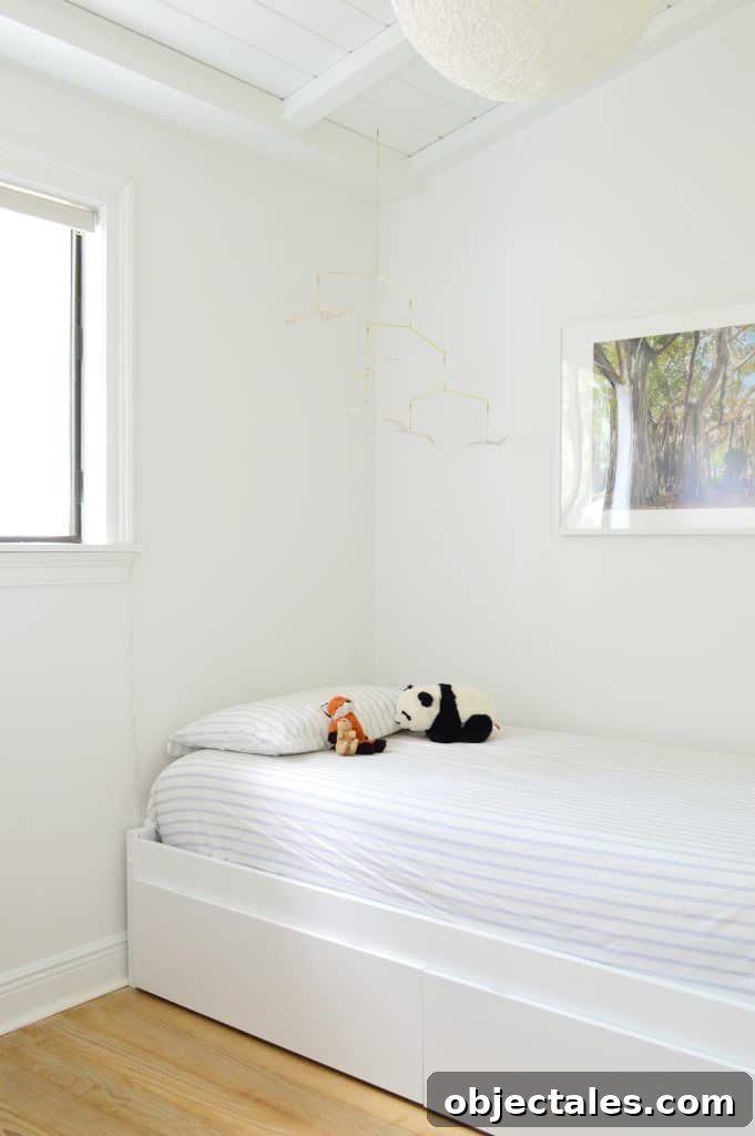 Before photo of boys bedroom with daybed and blank walls