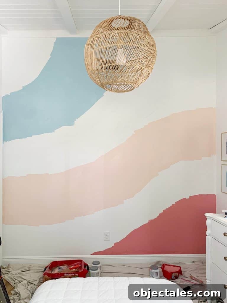 First three stripes painted in abstract wall mural in girls room.