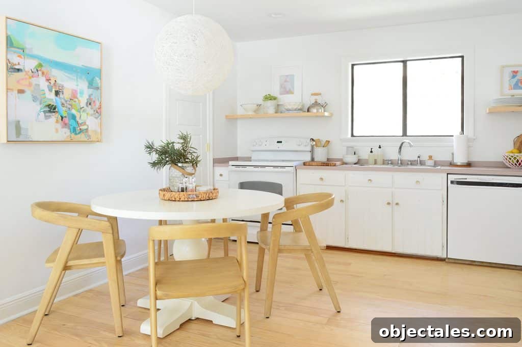 5 Quick Kitchen Upgrades That Transform Your Space 7 MInimal Kitchen With New Woven Globe Pendant From Pottery Barn Teen