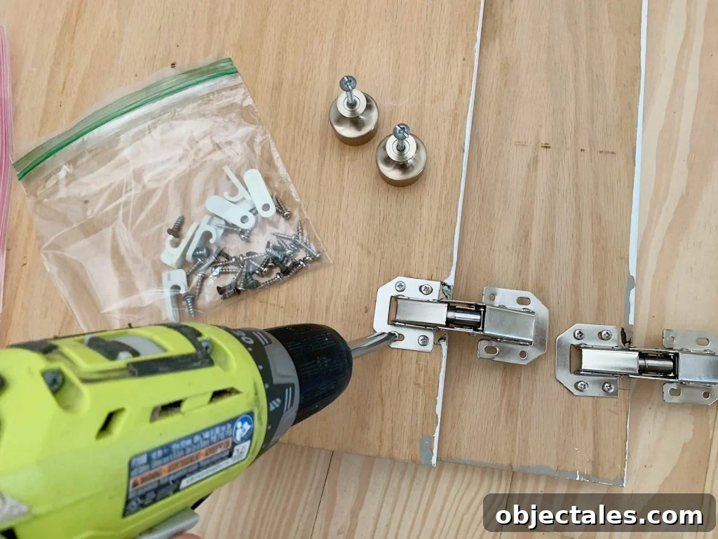 Before and After: Pink Kitchen Cabinets Makeover 10 Screwing hidden hinges on backs of wood cabinet doors