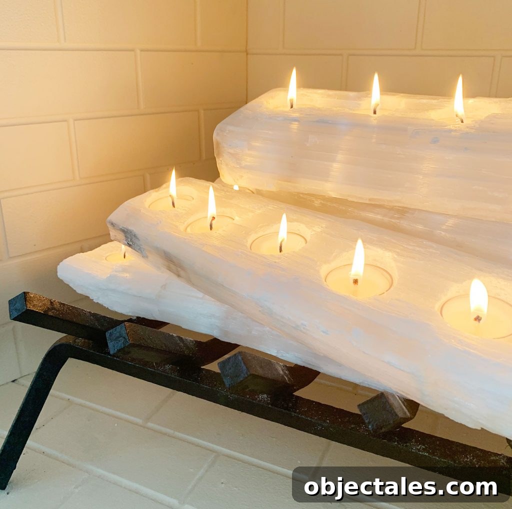 Close-up of tealight holder crystal logs with candles lit