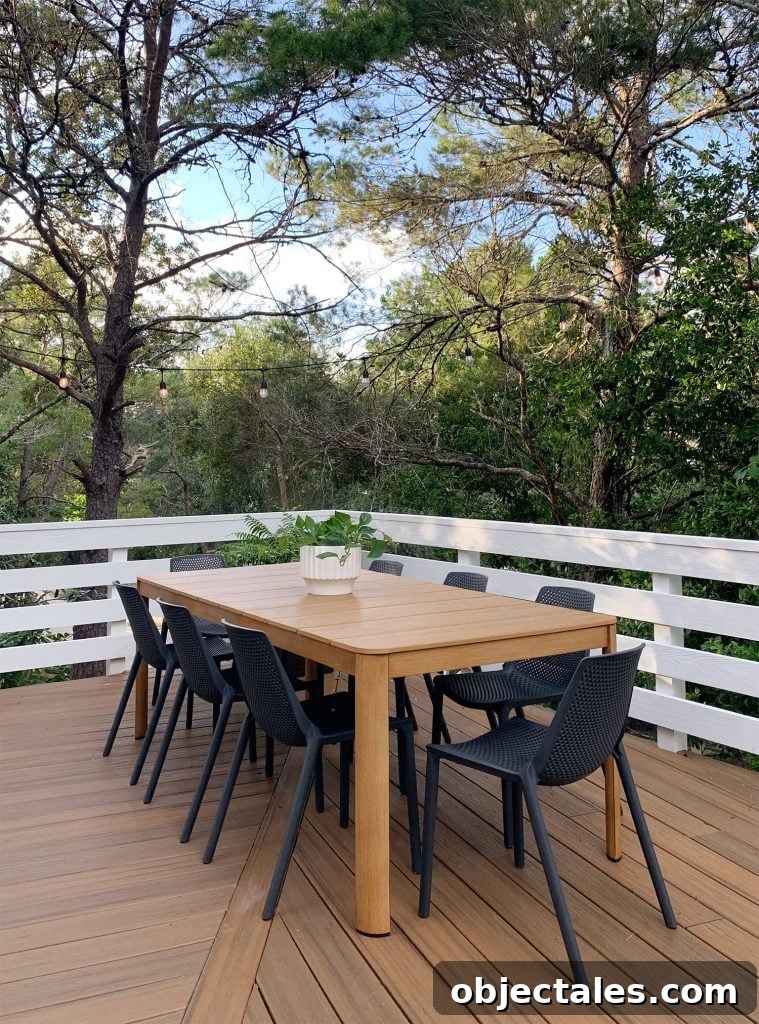 Low-Maintenance Outdoor Furniture Ideas to Refresh Your Deck 9 Faux Wood Metal Outdoor Dining Table With Black Chairs Surrounded By Trees