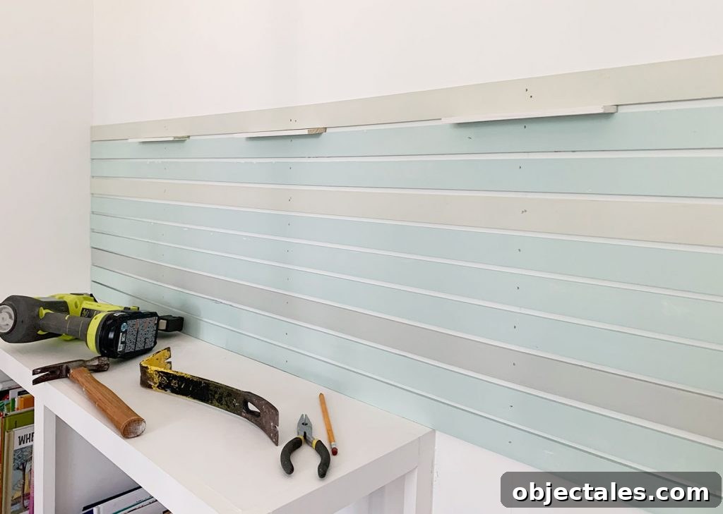 How to Create a Colorful Wood Accent Wall 12 First Section Of Painted Wood Lattice Strips Attached To Wall Using Spacers