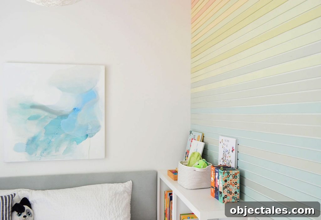 How to Create a Colorful Wood Accent Wall 21 Abstract Blue Painting Next To Rainbow Stripe Wall Treatment