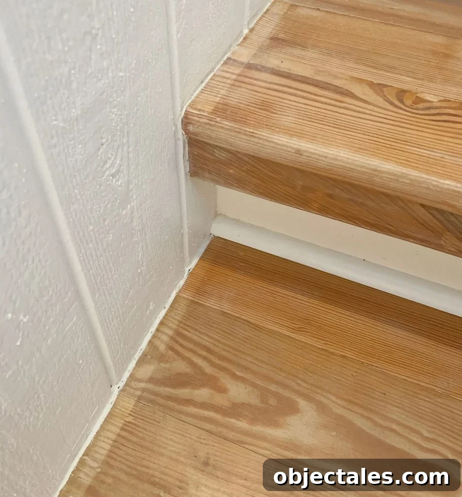 Close Up Photo Of Wood Stairs With Discolored Border