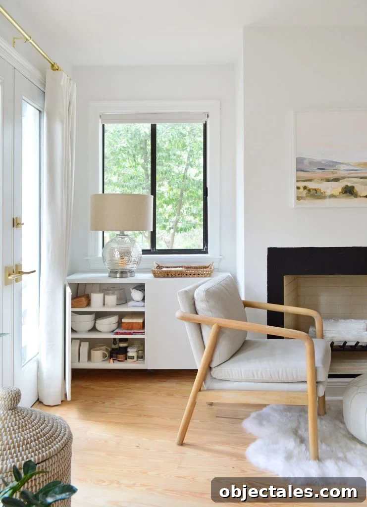 How to Build a Custom Media Cabinet with IKEA Besta 12 Besta Cabinet In Bedroom With Door Open Showing Decor Storage