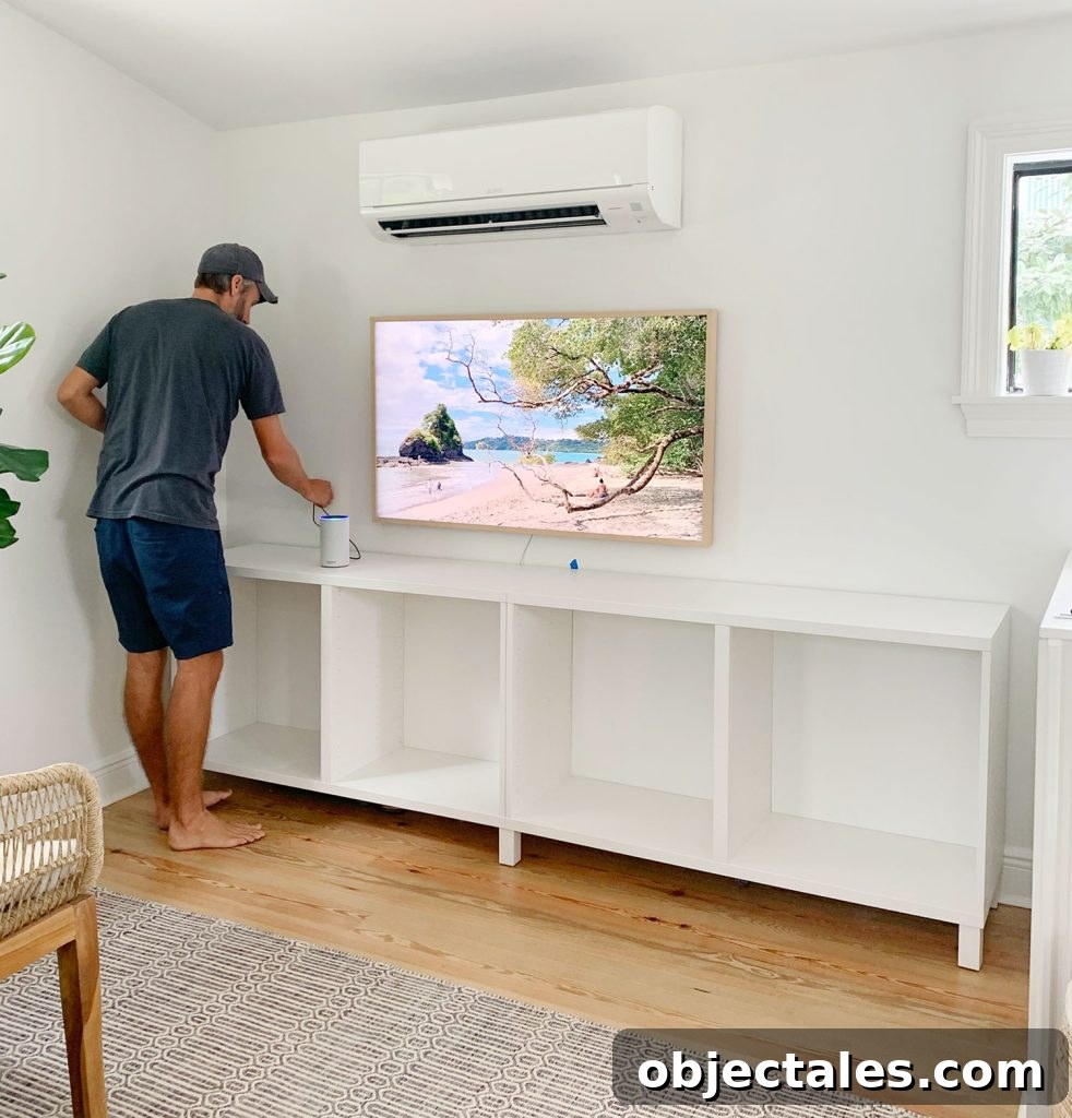 How to Build a Custom Media Cabinet with IKEA Besta 6 John Working On Installing Ikea Besta Cabinets In Family Room