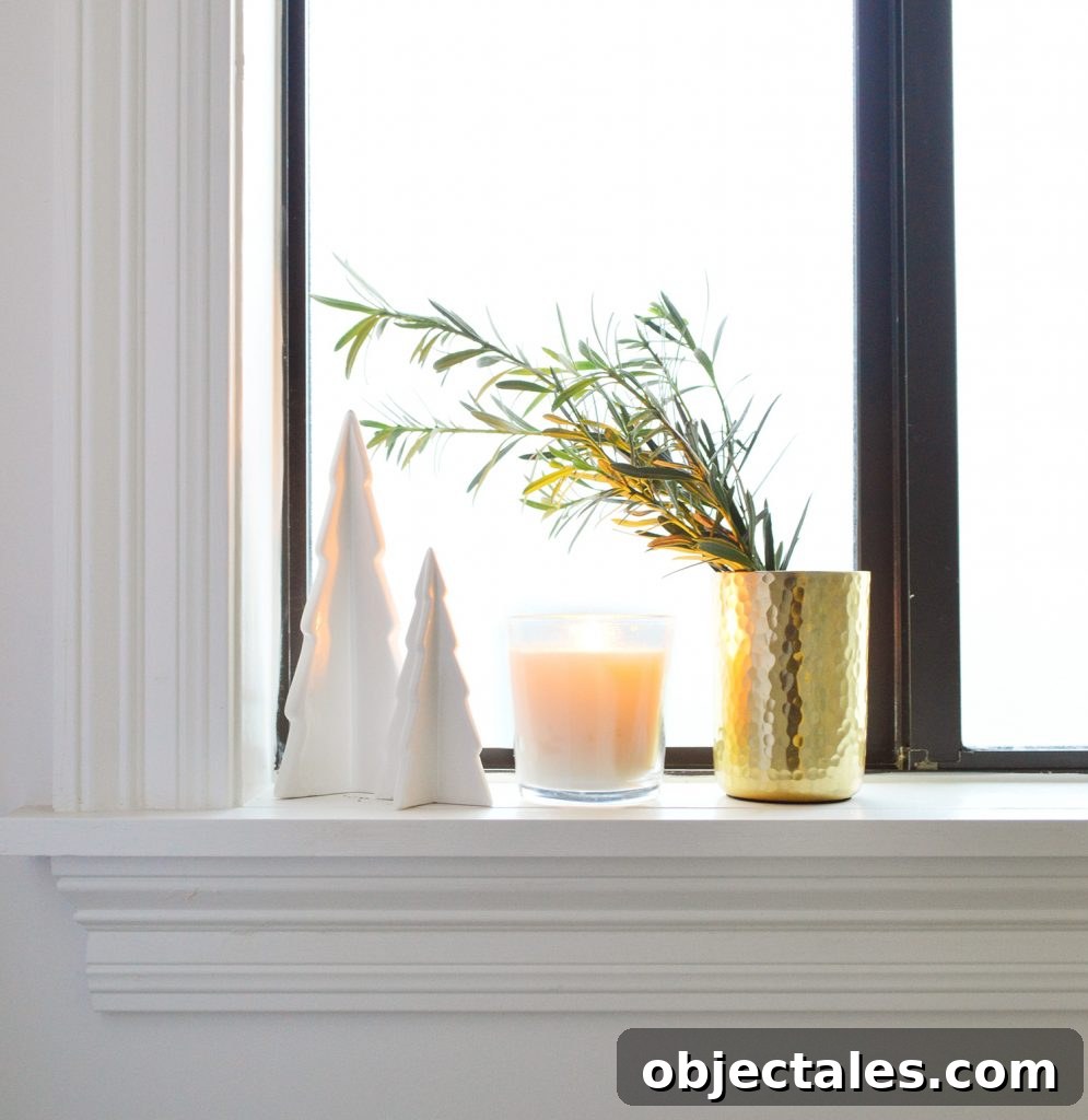 Holiday Decorating Ideas for Downsized Homes 9 White Ceramic Trees With Candle And Gold Vase On Bathroom Window Sill