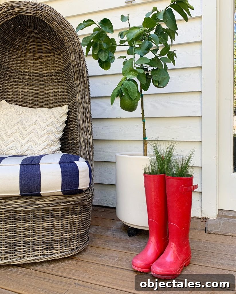 Holiday Decorating Ideas for Downsized Homes 11 Red Boots With Holiday Greenery On Front Porch
