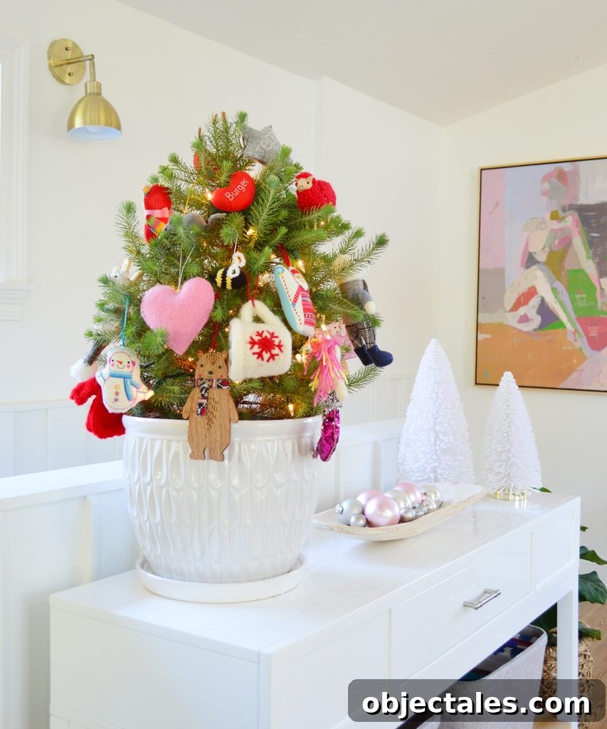Holiday Decorating Ideas for Downsized Homes 3 Small Tabletop Tree In White Pot With Colorful Ornaments