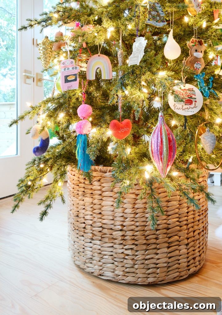 Holiday Decorating Ideas for Downsized Homes 7 Woven Basket At Base Of Christmas Tree With Colorful Ornaments